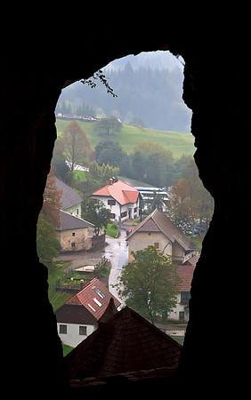 LOOKING OUT FROM PREDJAMA CASTLE